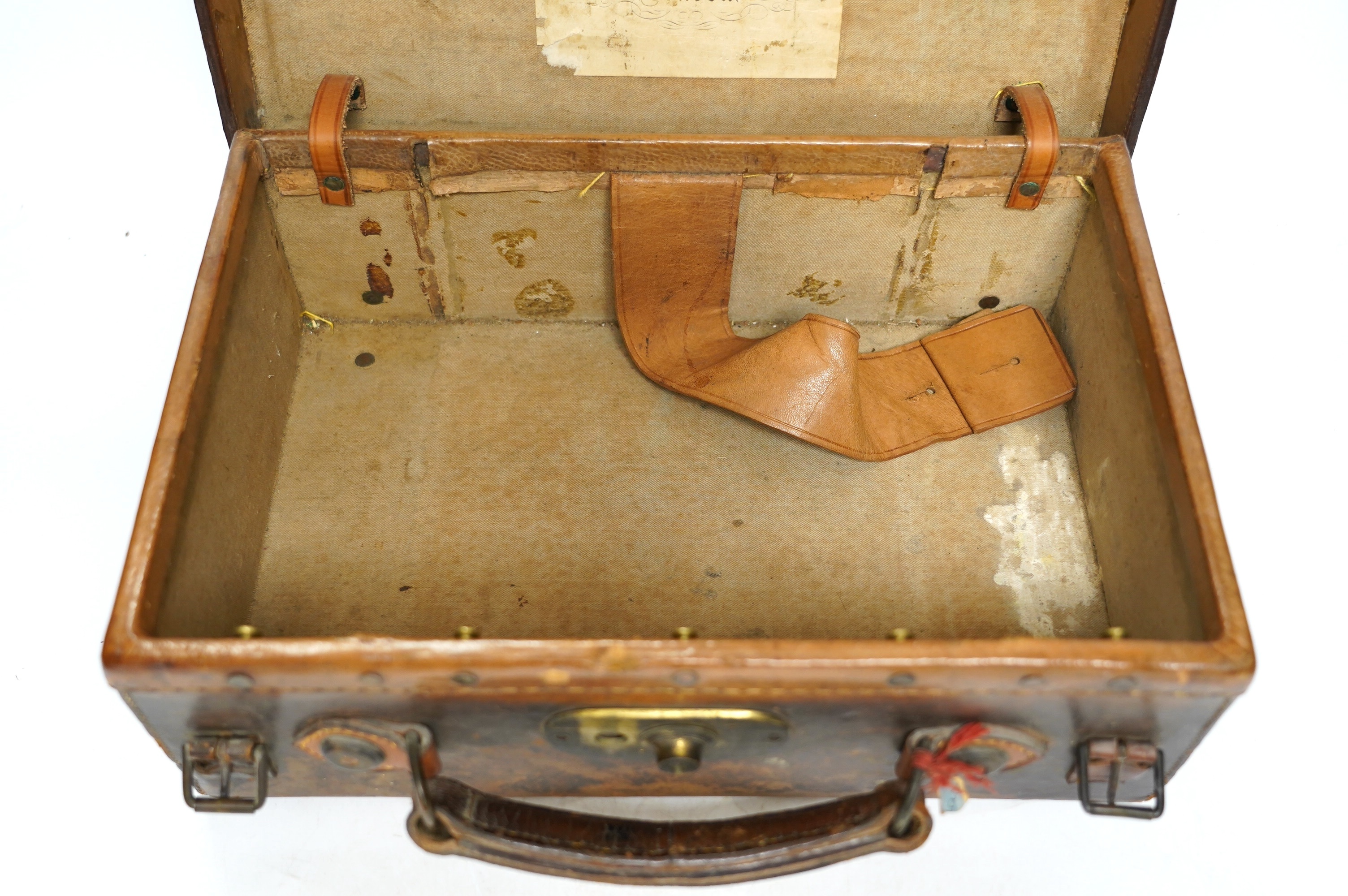 A Victorian Westley Richards & Co leather ammunition case, 38 x 26 x 13cm. Condition - fair